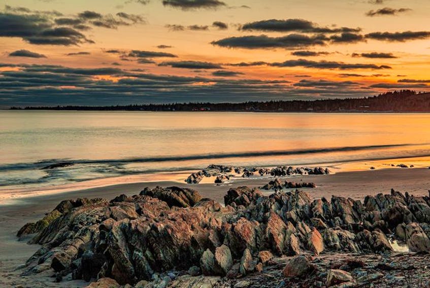 Barry Burgess captured this gorgeous sunset on Rissers Beach in Petite Rivière, N.S. The sharp rocks almost remind me of dragon scales; despite their roughness, they do not take away from the serenity of this scene. Thank you, Barry.