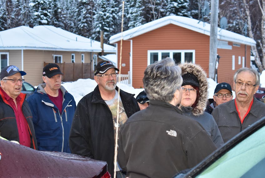 A crowd gathered in front of Cathy Breen’s property last week to discuss the issue with the sale of backlands and to air some frustrations.