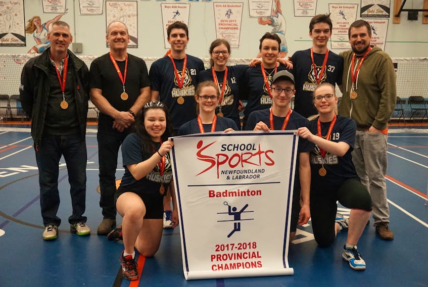 Dorset Collegiate of Pilley’s Island are back-to-back provincial badminton champions. Front, from left: Brianna Warren, Isabella Winsor, Ashton Thomas, and Angel Wiseman; Back: Coaches Jeff Tizzard and Denzil Reid, Benjamin Tizzard, Laura Callahan, Ty Winsor, Jesse Short, and teacher-sponsor Alex Hutchings.