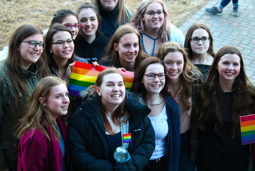Members of the school’s Gender Sexuality Alliance (GSA) and Indian River High student body pose for a photo outside the town hall.