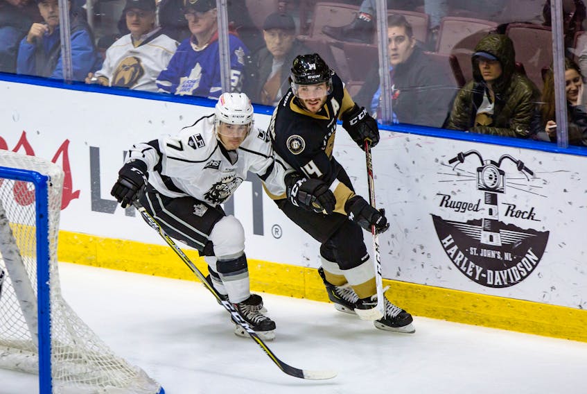 Newfoundland Growlers forward J.J. Piccinich (right) is shown in action against the Manchester Monarchs at Mile One Centre earlier this month. The Growlers take on the Orlando Solar Bears in ECHL play in Florida tonight, and as it stands, Piccinich will be the only former member of the Solar Bears suiting up for Newfoundland tonight. Orlando had been the Toronto Maple Leafs' ECHL affiliate for five years before the Maple Leafs hooked up with expansion Growlers this season. — Newfoundland Growlers photo/Jeff Parsons