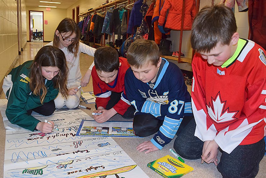 Canadians from coast-to-coast paid tribute to the Humboldt Broncos on Tuesday by wearing hockey jerseys to work, school or play.