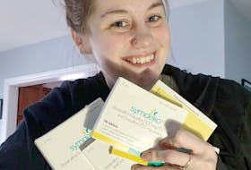 Nicole Turple holds a four-month supply of Symdeko, a medication for cystic fibrosis, that was gifted to her by Mark and Kelly Lindsay on Monday, March 2, 2020. The Lindsays gave Turple the medication after their 23-year-old daughter Chantelle passed away from the genetic disorder on Feb. 19, 2020.