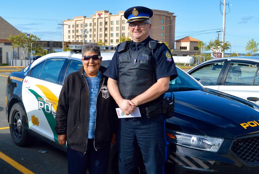 Shirley Christmas and Cape Breton Regional Police Service Sgt. Graham Smith are among those who will be raising awareness about texting and driving on Friday in Membertou. It’s the third consecutive year a check stop will be held.