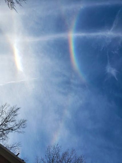 An infralateral arc is a rare halo, an optical phenomenon appearing similar to a rainbow under a white parhelic circle.