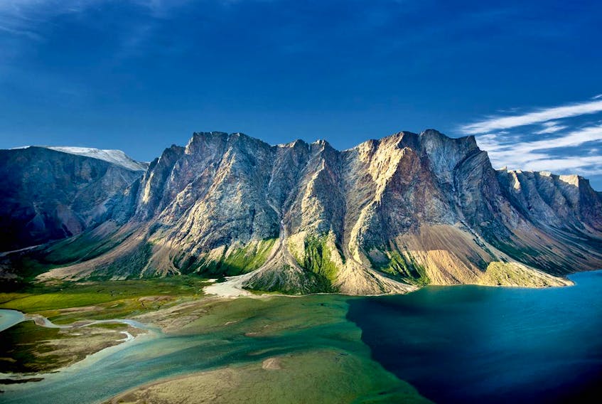 "Wouldn't it be easier for both of us if you just posted a pic of the Torngats (e.g., Mount Caubvick) with a note that they rise to a height of over 5,400 feet, over twice as high as the highest point on the island?"

Thank you for submitting this stunning photo, Mr. Logan.