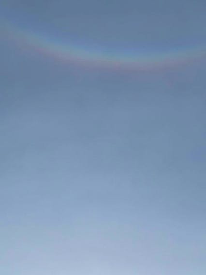 When Gina McLeod looked up and spotted this circumzenithal arc, she knew that her stepfather Myron was smiling down on her.