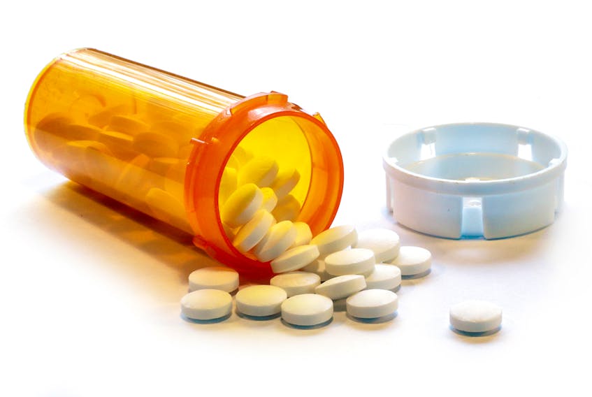 Open Bottle of Prescription Painkiller Pills