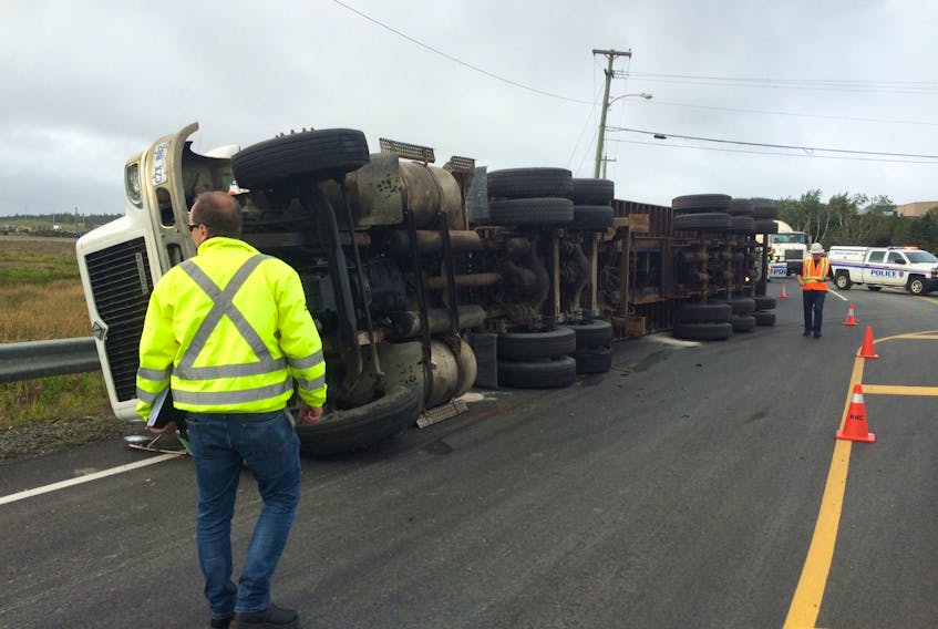 A tractor trailer overturned in the east end of St. John's is causing traffic delays. The driver has been sent to hospital to be checked over.