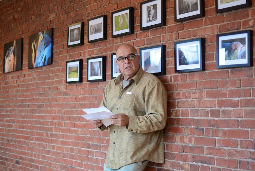 Richard Dittami read several of his poems April 27 at the Riverside Gallery, during the Downtown Poetry portion of the Poetry at Large festival in Oxford.