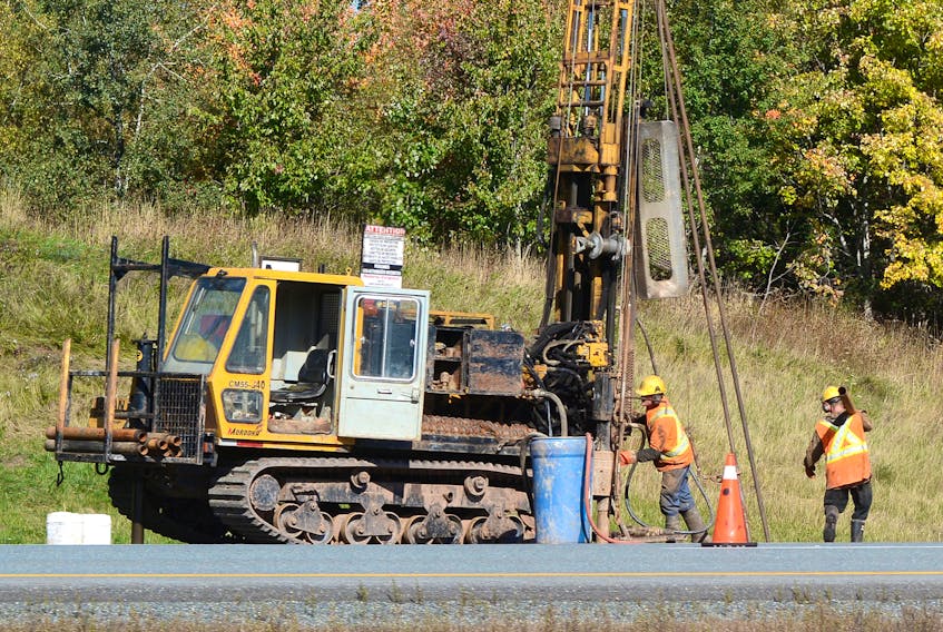 Crews from Logan Drilling and Harbourside Engineering conduct geotechnical testing on Wednesday on Highway 104 near Exit 6 in Oxford.