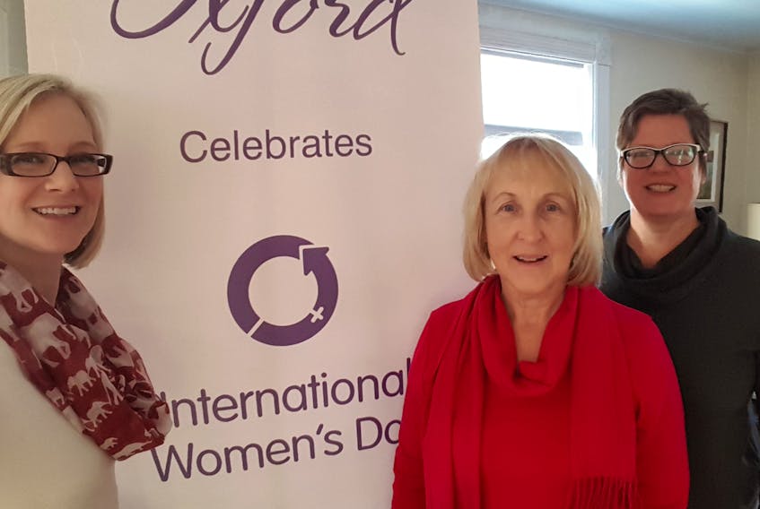 Members of the Oxford Celebrates International Women’s Day committee (from left) Sara Jewell, Ruthie Patriquin and Alison Draper are getting ready for this year’s celebration on Saturday from 2 to 4 p.m. at the Capitol Theatre in Oxford.