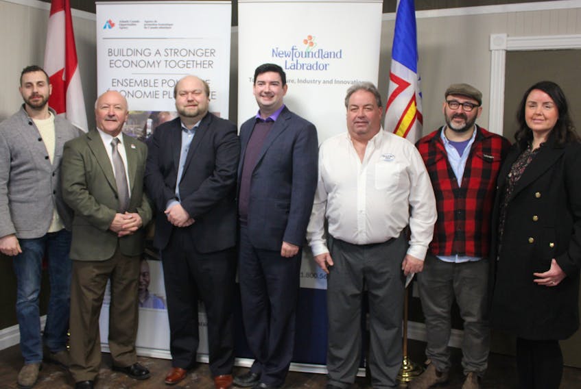 The government representatives and funding recipients at the announcement on Wednesday. From left to right: Mayor John Norman, President/Chair, Bonavista-Trinity regional Chamber of Commerce; Churence Rogers, MP Bonavista-Burin-Trinity; Bonavista District MHA Neil King; Honourable Christopher Mitchelmore, Minister of Tourism, Culture, Industry and Innovation;  Carl White, Director, Seaport Inn; Peter Burt & Robin Crane, owners, Newfoundland Salt Company Ltd.