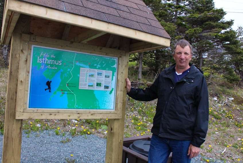Arnold’s Cove Mayor Basil Daley with the newly installed trail signage at Bordeaux Trail in Arnold’s Cove.