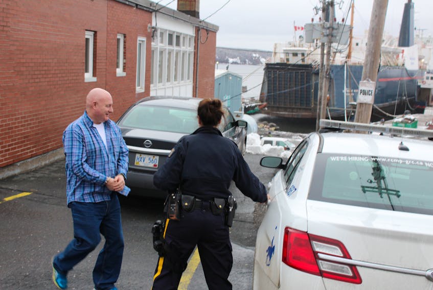 Dean Culleton lead out of Clarenville provincial court by RCMP.