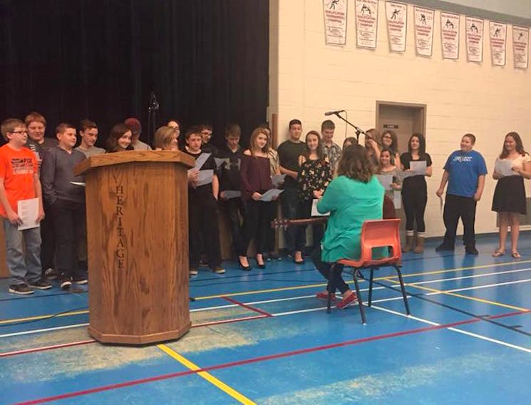 Heritage Collegiate Grade 8 class performed a ballad at the ceremony.