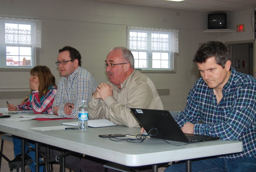 DFO public meeting facilitators, from left to right: Kelly O’Brien, David Small, Ron Burton and Jason Simms.