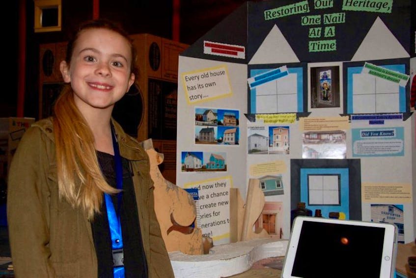 Klaire Hayward with her Heritage Fair project.