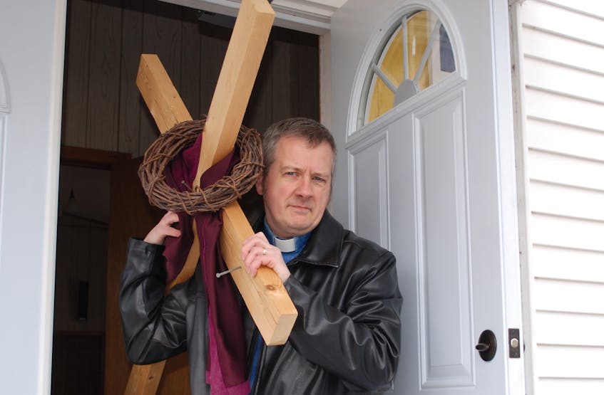 Reverend Bob Mercer ahead of his trek from Deep Bight to Clarenville, carrying a cross in recognition of Good Friday. He has been the minister at the Clarenville and Deep Bight churches for the last seven years.
