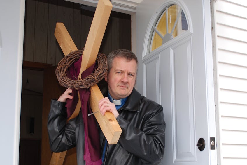 Reverend Bob Mercer ahead of his trek from Deep Bight to Clarenville, carrying a cross in recognition of Good Friday. He has been the minister at the Clarenville and Deep Bight churches for the last seven years.
