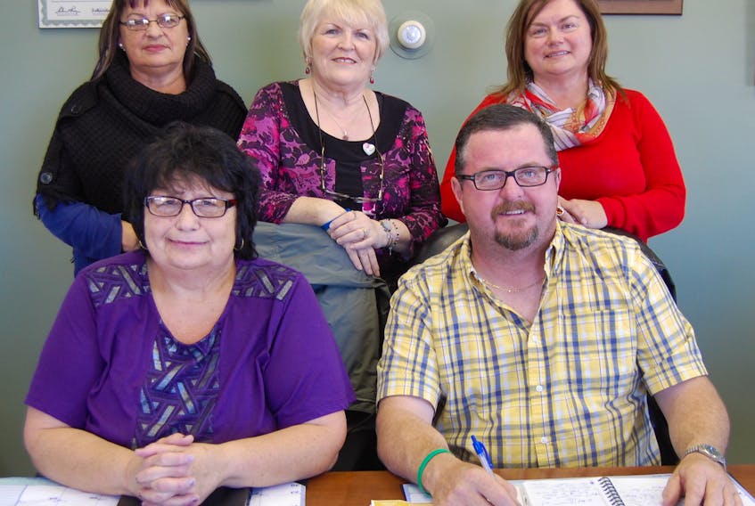 The Bonavista Ambulance Committee. Front, from left, Beverly Dyke and Coun. Reg Butler; and back, Marilyn Randell, Bernice Clements and Lisa Mouland. Missing is Coun. Calvin Rolls.