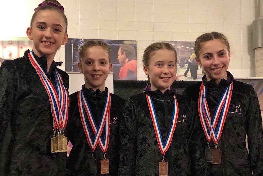 From the left, Velocity Gymnastics team members Erin Russell, MacKenzie Parsons, Lilly Bennett and Rayah Vokey.