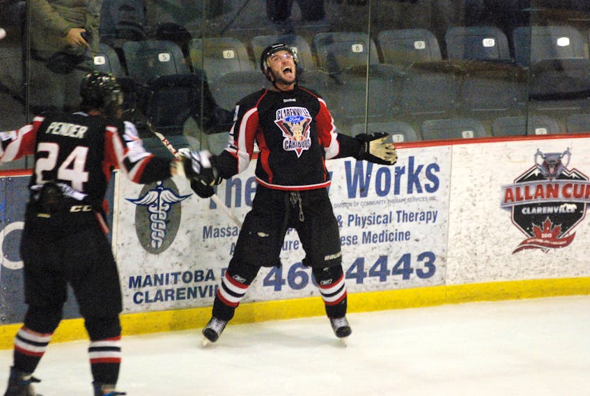 Kevin Reid celebrates a go-ahead goal near the end of the second period during Friday night's game 5 at the EEC.