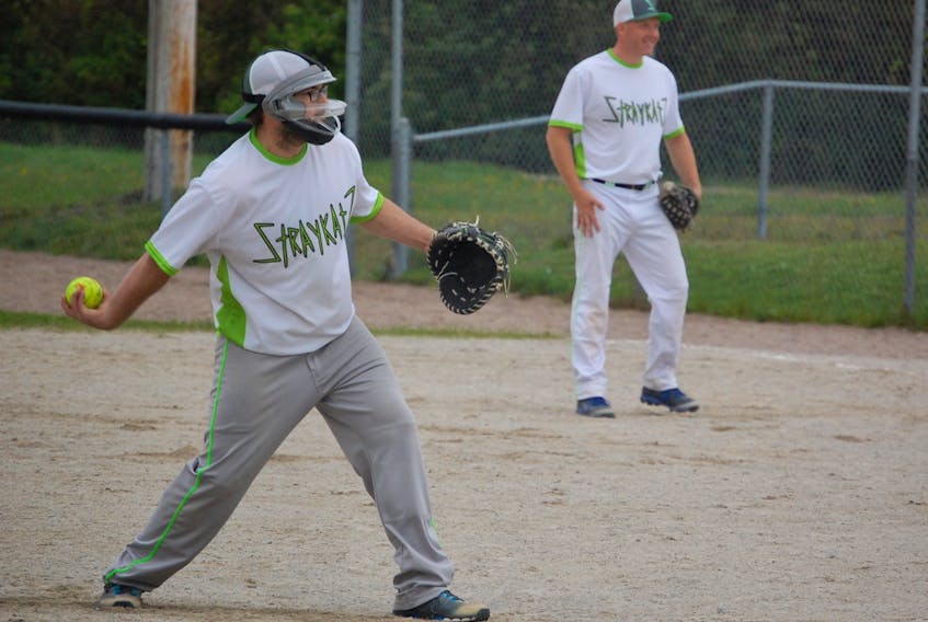 Zach Humby began wearing a mask when he pitched playing slo-pitch softball this year after a close call.