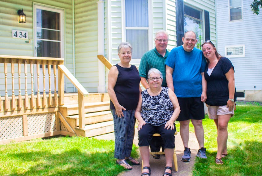 The Matheson family recently donated a house to Summer Street Industries. From left are donors Sandra Matheson, Susan Matheson, Alan Matheson, Summer Street participant Frankie Dorrington and Summer Street manager Jannesta Sharpe. CONTRIBUTED