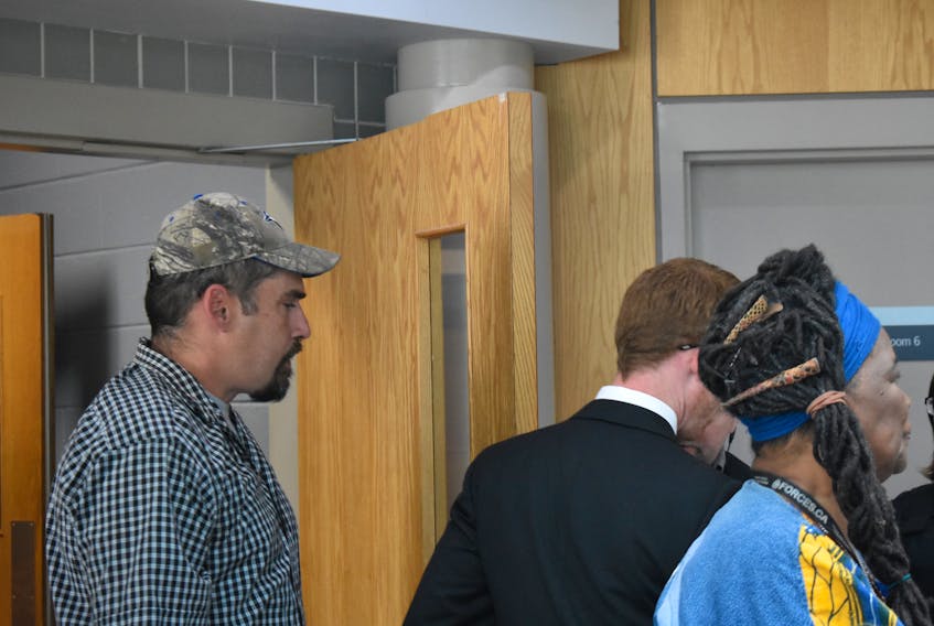 Shawn Wade Hynes exiting the courtroom at Pictou Provincial Court on Sept. 26 after a judge found him guilty on charges of criminal negligence causing bodily harm and assault with a weapon.