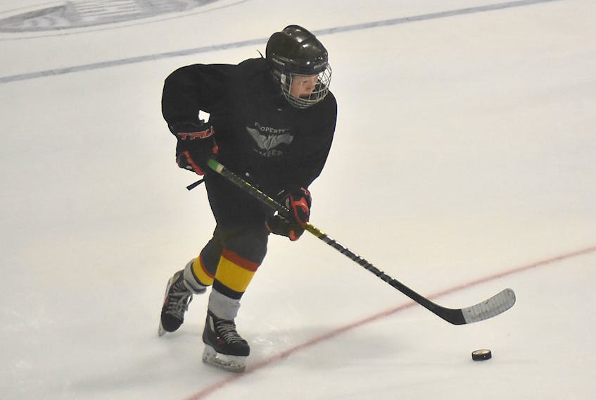Keegan Dalton of the Pictou County WearWell Major Bantams carries the puck in an exhibition game on Aug. 30.