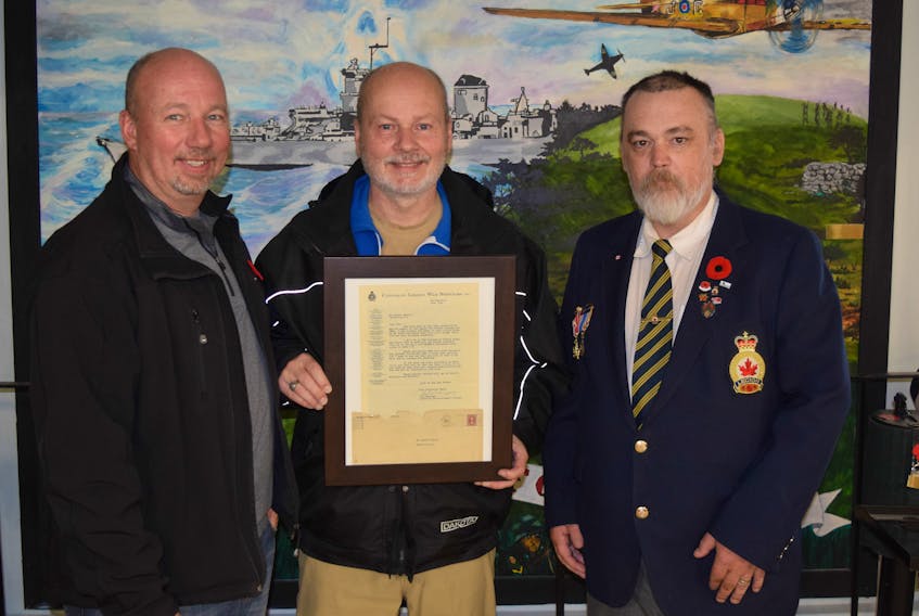 Brothers Ian and Glenn MacIntosh are pictured with Westville Legion Vice President Joe Stewart, who helped connect them with a letter that had been addressed to their grandfather 78 years ago.