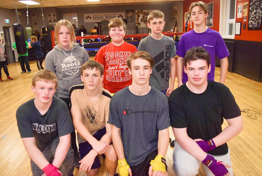Shown are the local boxers scheduled to take part at the Albion Boxing Club’s Nov. 16 card. In from from left are: Ian MacLeod, Cameron Munroe, Noah Thompson and Rob MacLeod. In back from left are: Sadie LeBlanc, Caden MacDonald, Carson Scholes and Tyver Stewart.