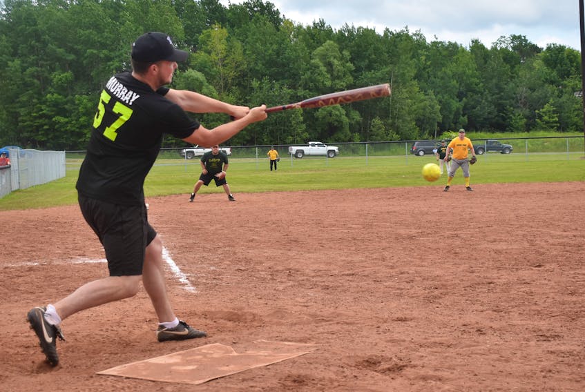 Matt Murray is shown here talking a rip at a pitch for the Bombers Club team at the annual Harvey Dickson Memorial Ball Tournament. It took place this past weekend in Trenton, part of Trenton Funfest activities.