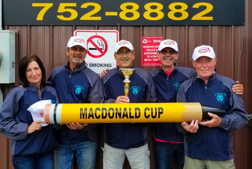 From left, Bernadette Rondelet, Rob Rondelet, MacDonald Cup host Mike MacNaughton, Kirby Rondelet and Bookie MacDonald.