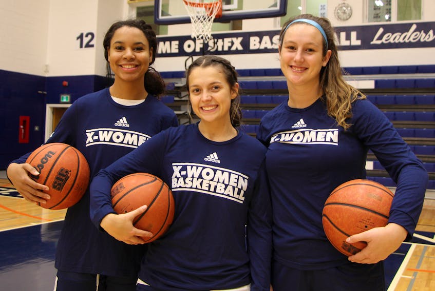 New Glasgow natives, from left, Aliyah Fraser, Lucia MacKay and Jamie McCarron are key players with the StFX X-Women’s basketball program.