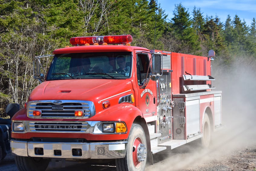 Multiple fire departments respond to a forest fire in Antigonish County, on May 25, 2020.