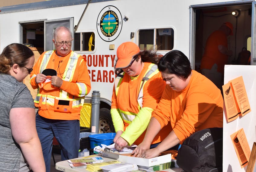 Art Frost, Mary-Ann Spears and Jannette Brown, helped organize an information session for Pictou County Ground Search & Rescue outside Wal-Mart in New Glasgow on Sept. 21.