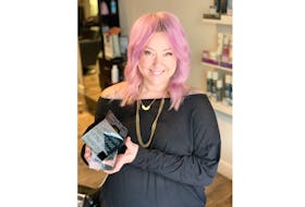 Chelsea Sutherland with her Contessa Atlantic Hairstylist of the Year Award for 2021.