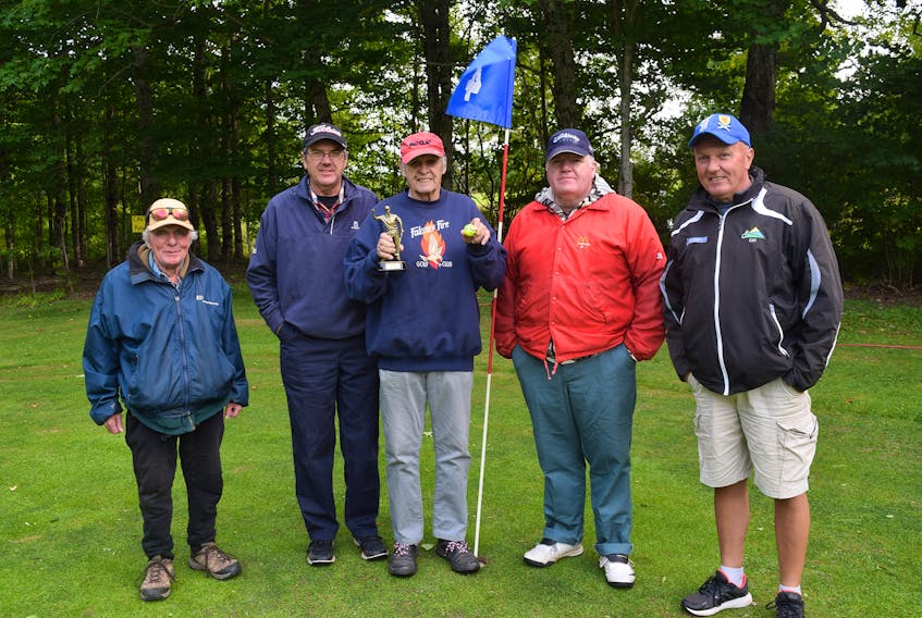 Paul MacLean, Craig MacLean, Fred Smith, Jeffrey MacLean and Scott MacLean all enjoy golfing together. Smith recently had a hole-in-one at the Hopewell Links and to celebrate his friends bought him a trophy.