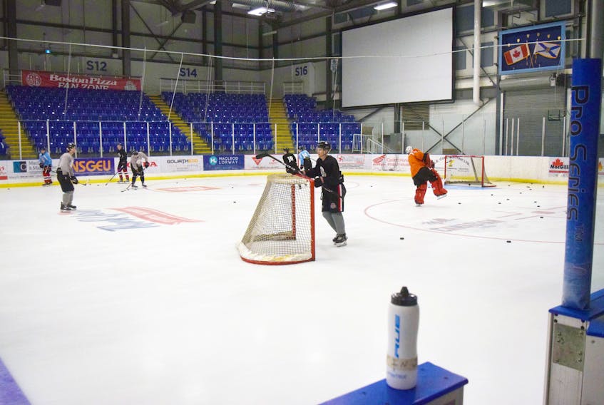 The Pictou County Weeks Crushers warm up for a practice at the Pictou County Wellness Centre.