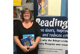 Karen MacNeill, office manager  for the  Pictou-Antigonish Regional Library regional headquarters is getting ready to register a new group of Wow! Reading Challenge readers.