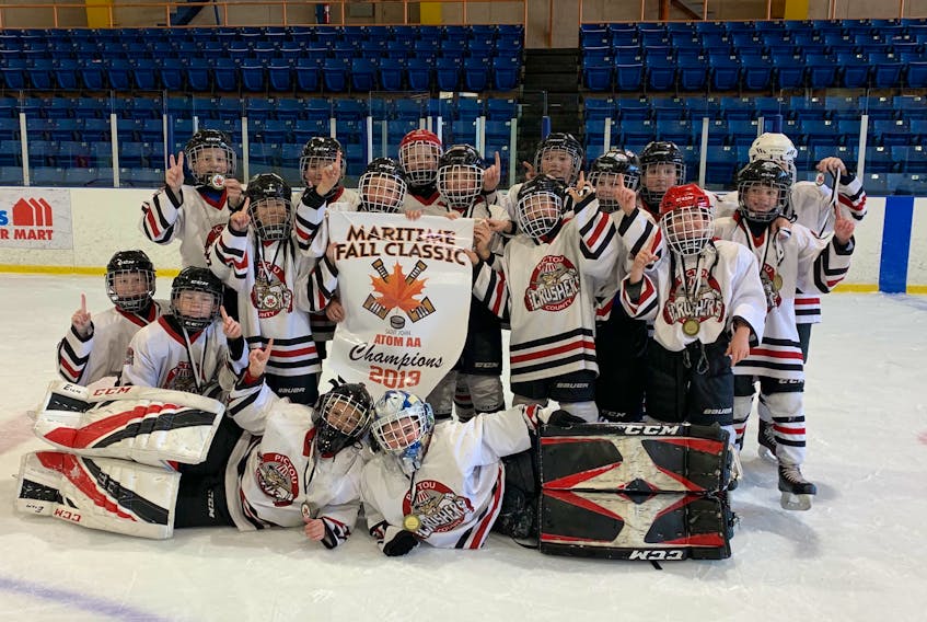 The Pictou County Atom AA Crushers Red hockey team won gold at the Maritime Fall Classic in Saint John, N.B. recently.