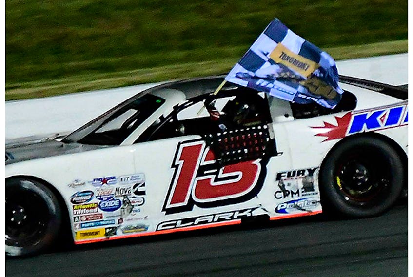 Cassius Clark, racing for Pictou County-based King Racing, waves the checkered flag on Aug. 10 at Scotia Speedworld.