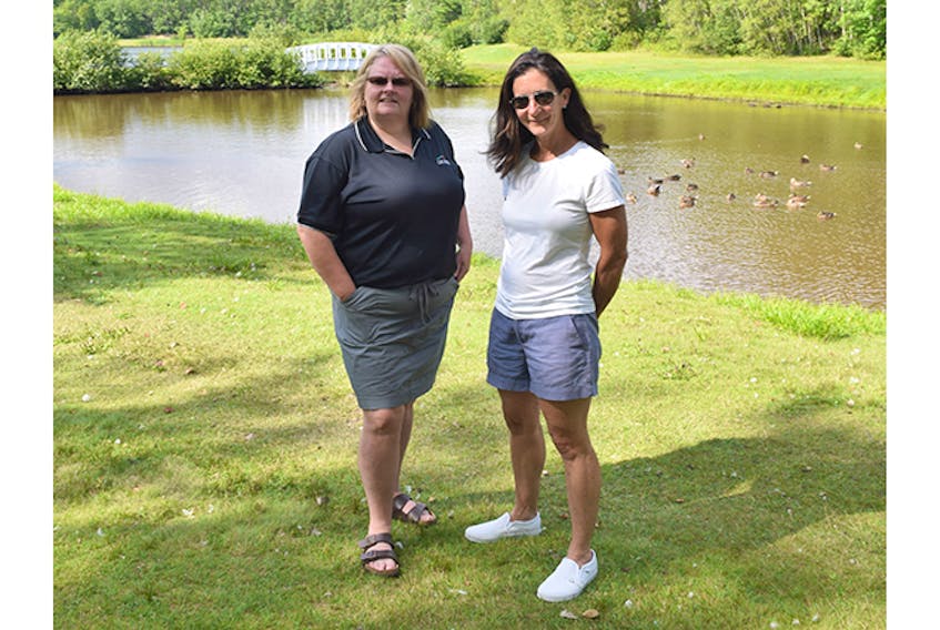 Cindy MacKinnon, shown at left, and Jen Bethell, vice-chair and chair respectively with the non-profit Hemlock Group, shown at Trenton Park.