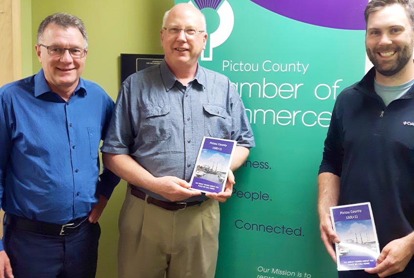 The Chamber of Commerce recently made a presentation of a booklet to the Pictou-Antigonish Regional Library. From left are Chamber executive director Jack Kyte, chief librarian Eric Stackhouse, and Chamber president Blair Van Veld.