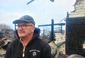 Myron MacQuarrie is still wondering what caused the fire that destroyed his company barn in Winsloe to burn down late at night on Feb. 1.