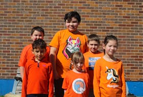 Children at Prince Street School are decked out for Orange Shirt Day Monday, where they learned about residential schools and Indigenous survivors. Back, from left, are Landon Saunders (Grade 3), Mason Larkin (Grade 6) and Fletcher Gallant (Grade 3), while front, from left, are Nidal Habash (Grade 1), Talia Blackett-Labobe (kindergarten) and Phoenix Labobe (Grade 1).