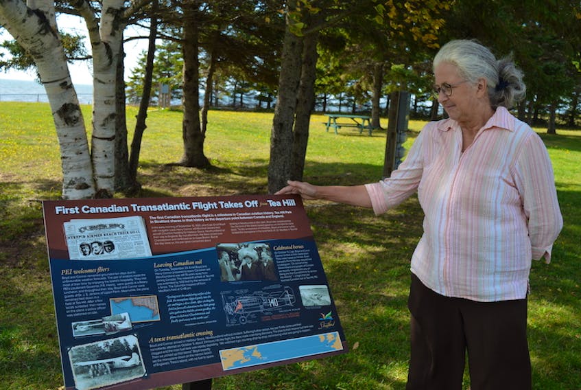 Aggi-Rose Reddin looks at an interpretive panel unveiled at Tea Hill Park in Stratford on Wednesday, commemorating the park’s connection to the first Canadian transatlantic flight.