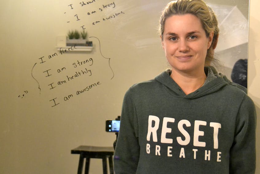 Tracey Gairns Brioux, who operates Reset:Breathe Fitness, is shown in her home studio. The fitness instructor entrepreneur regularly ends her classes with positive affirmations but has been dogged by expensive and slow internet service in her community of Emyvale.